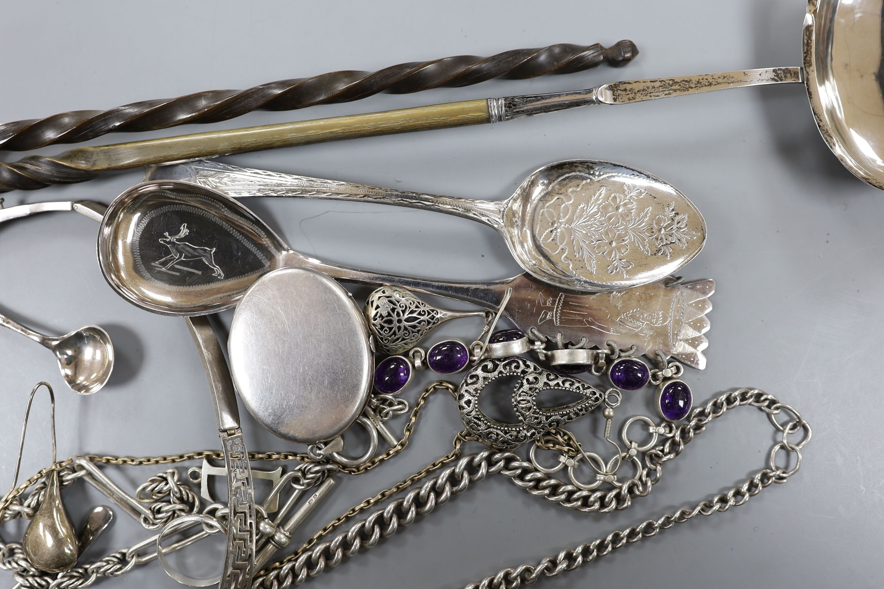 A group of assorted mainly silver items including toddy ladle, jewellery, pin cushion, cutlery etc.